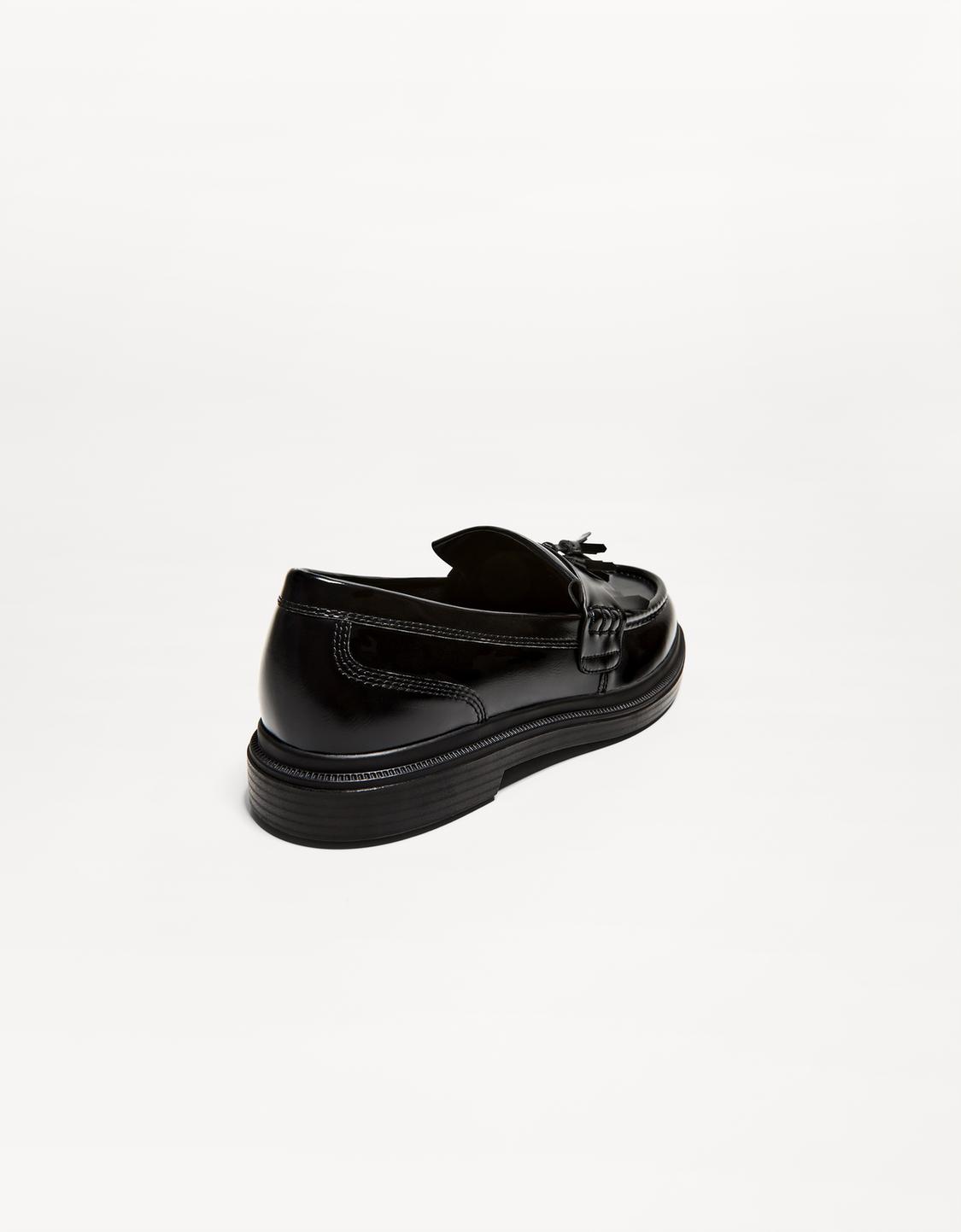 Fringed loafers with tassel