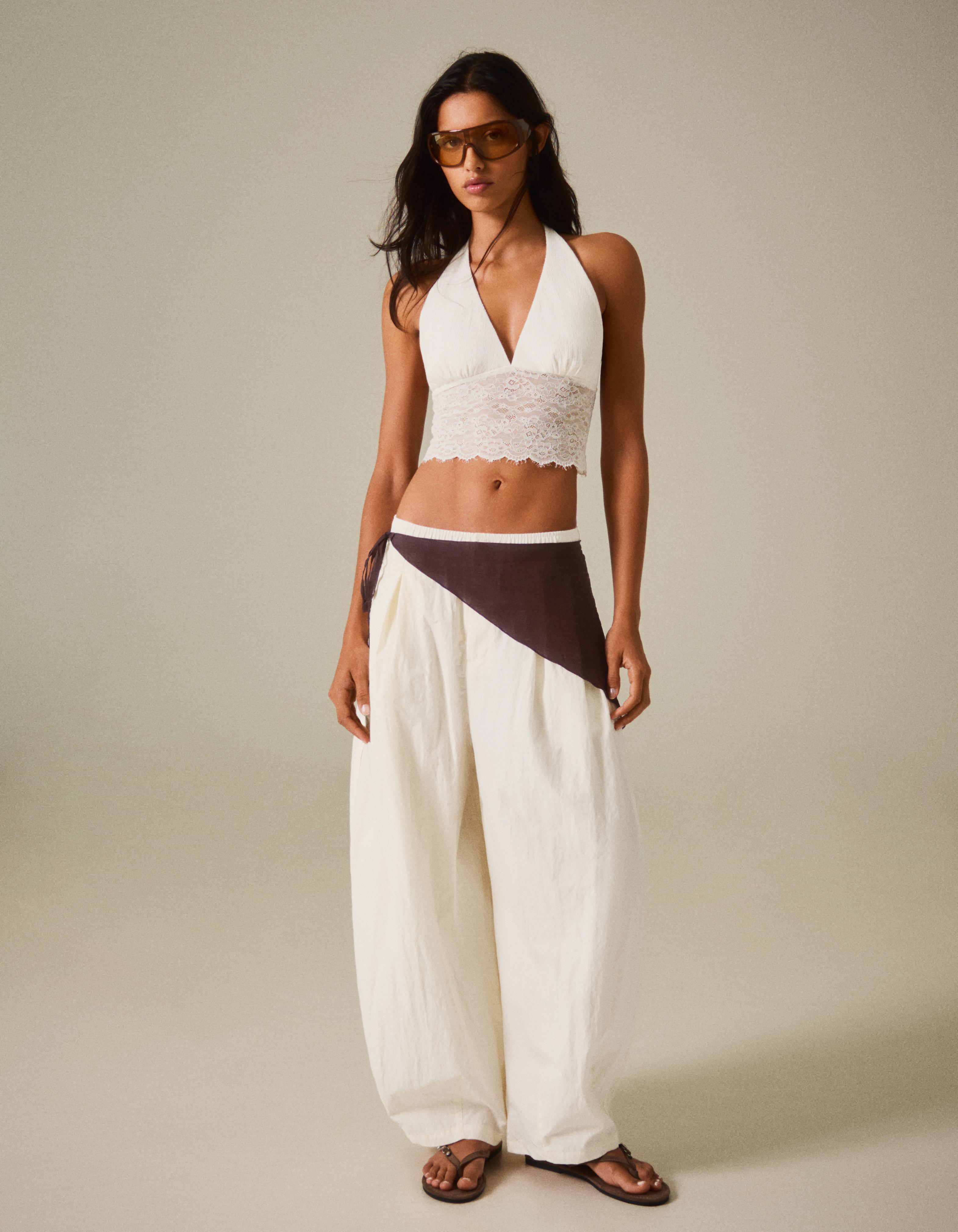 Rustic asymmetric lace top