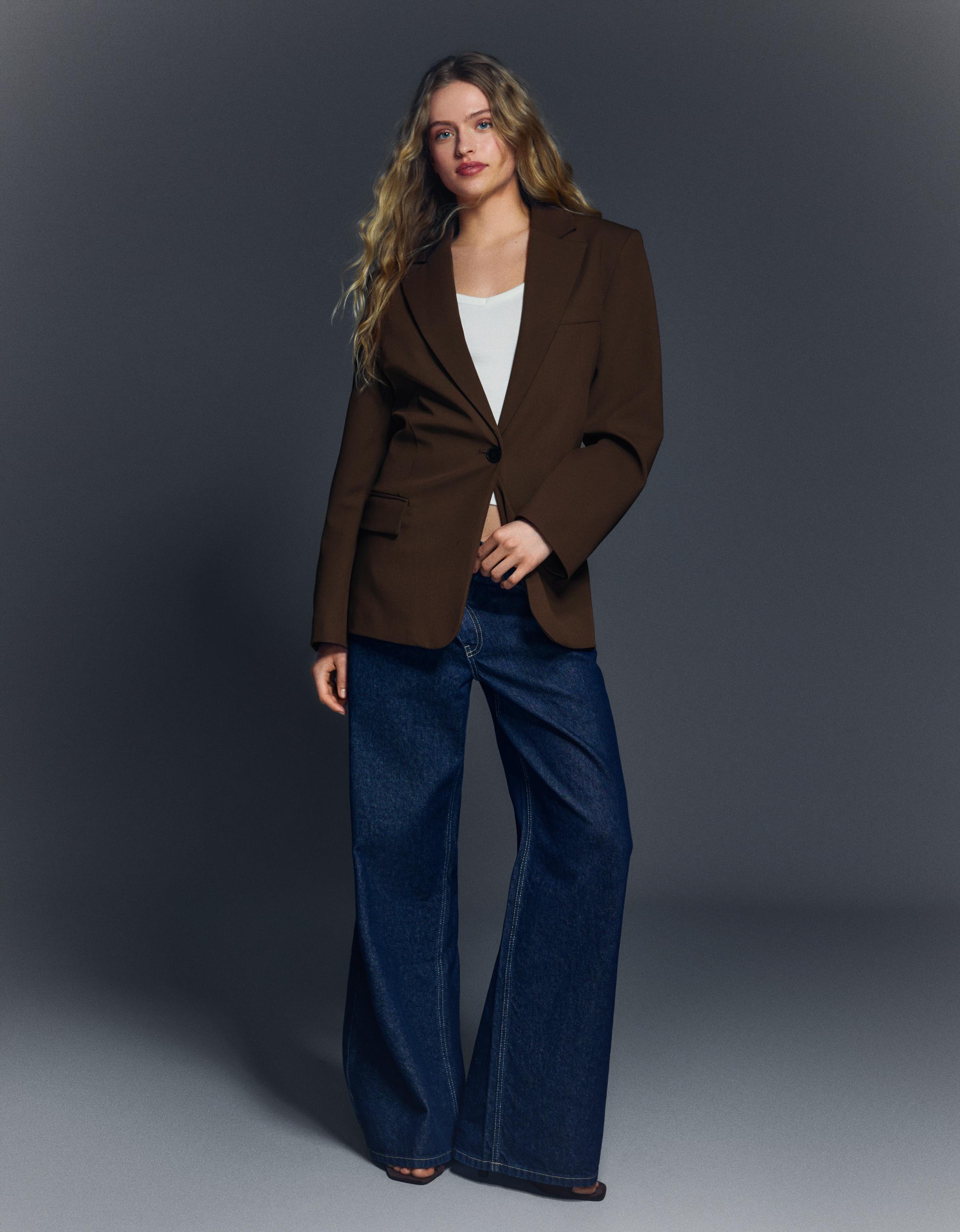 Blazer with back buckle