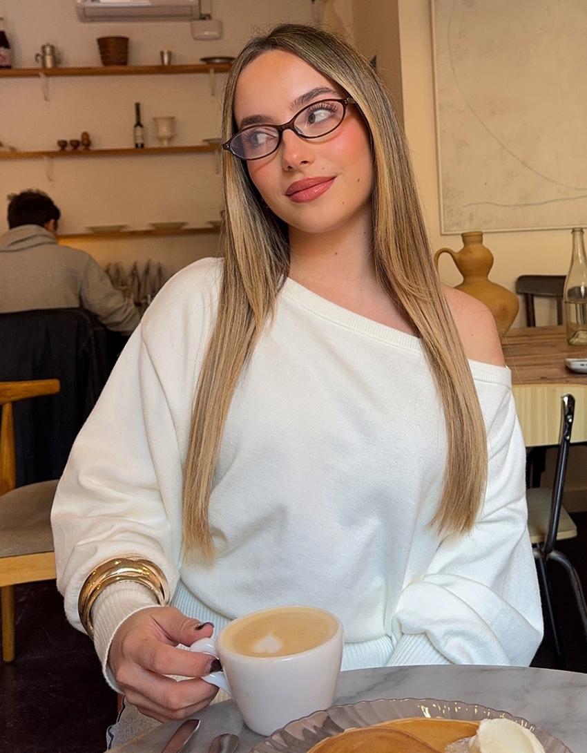 سويتر غير متماثل بطرف سفلي مضلع-كريمي