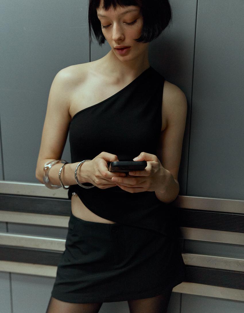 Asymmetric top with rhinestone ring-Black