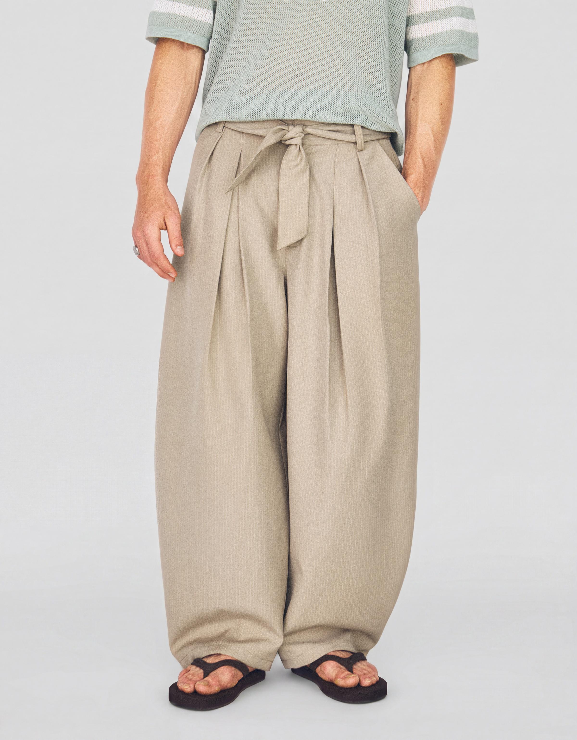 Barrel-leg trousers with darts and belt — Sand