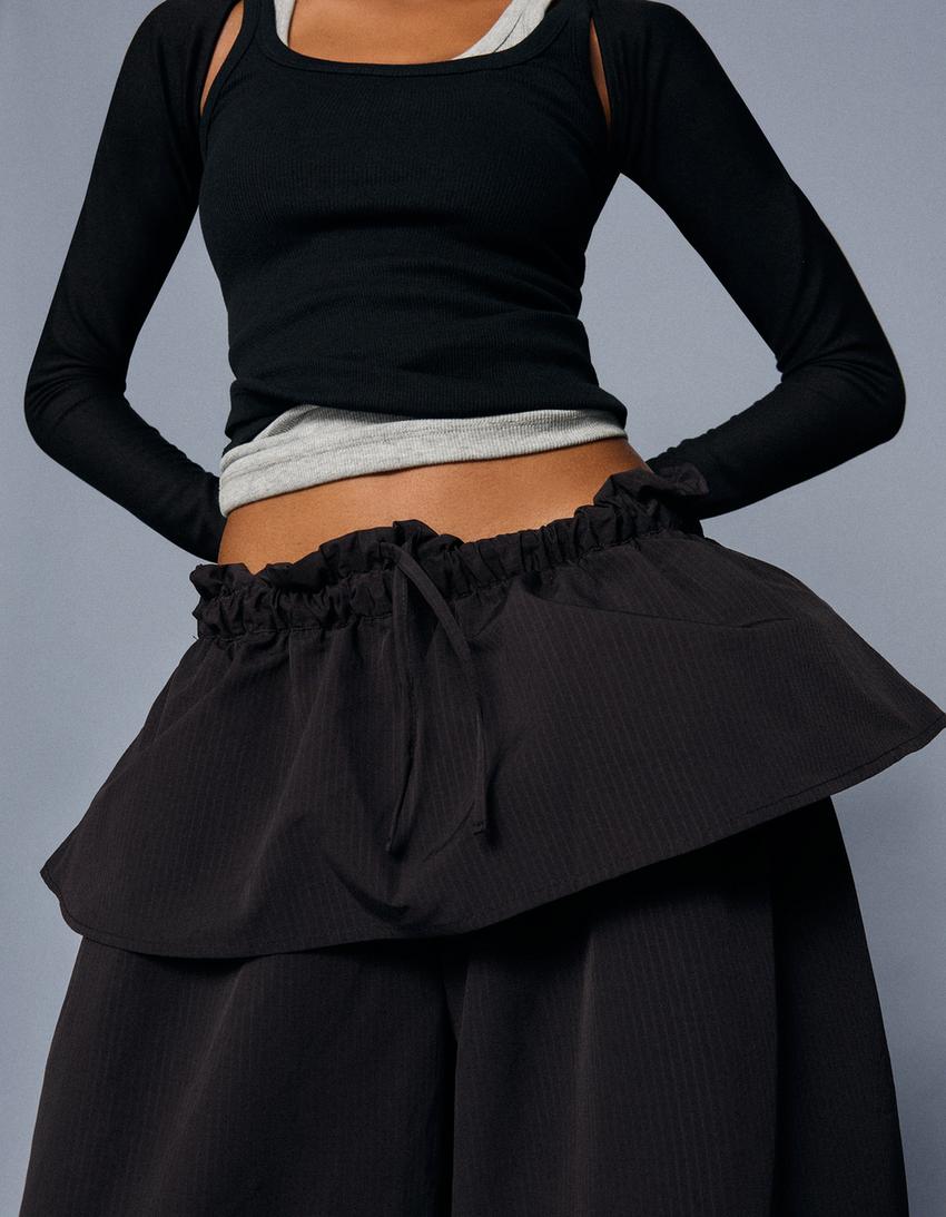 Technical trousers with peplum waist-Black