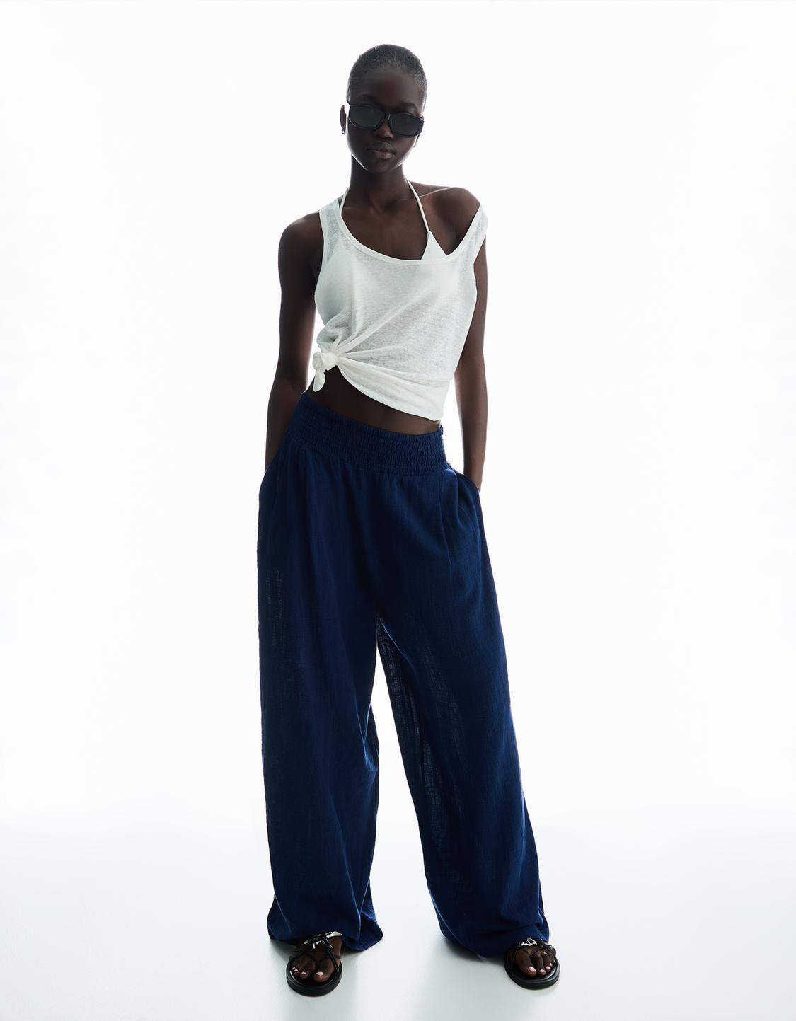 Wide-leg rustic trousers with darts