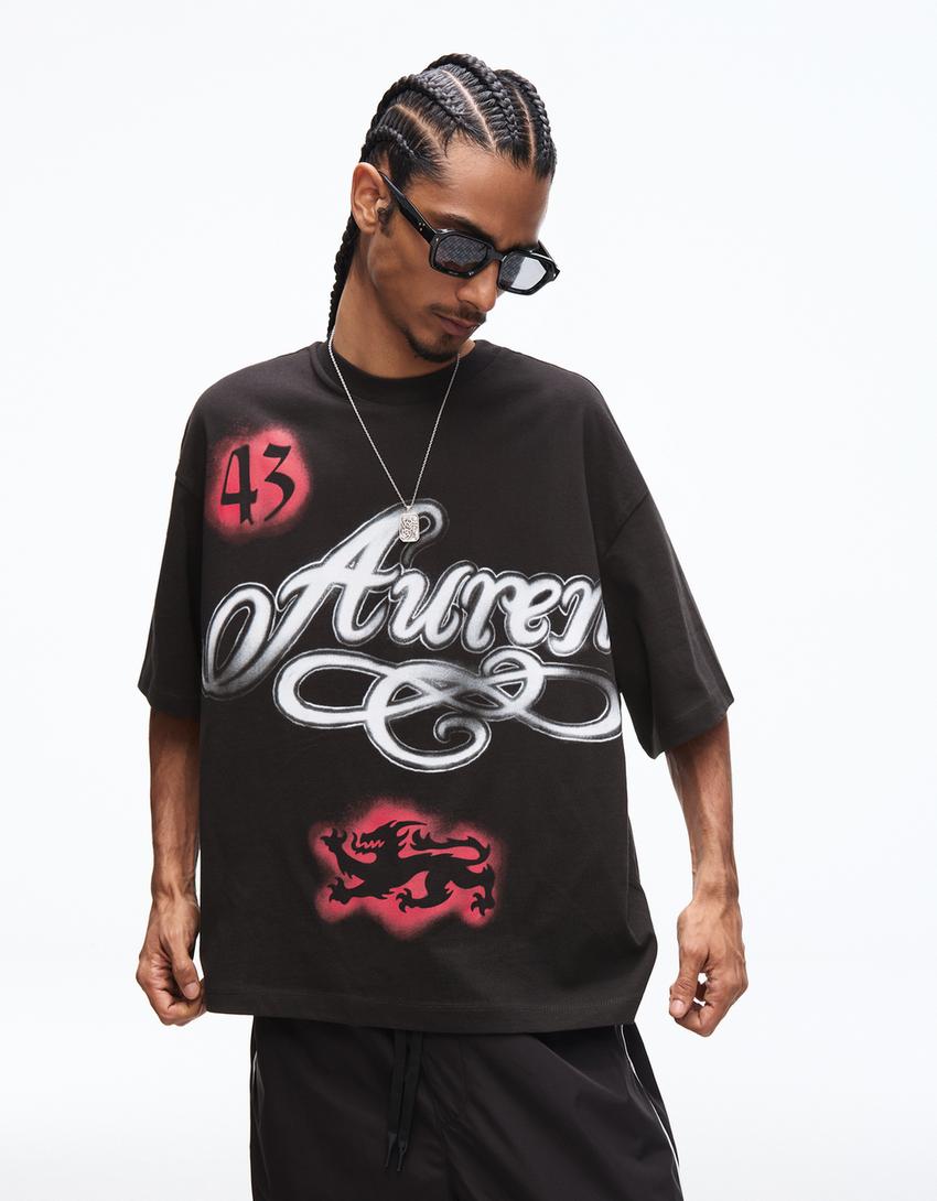 Boxy T-Shirt mit kurzen Ärmeln und Print-Schwarz