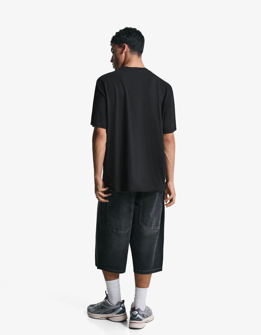 Kortärmad t-shirt med tryck-Svart-2
