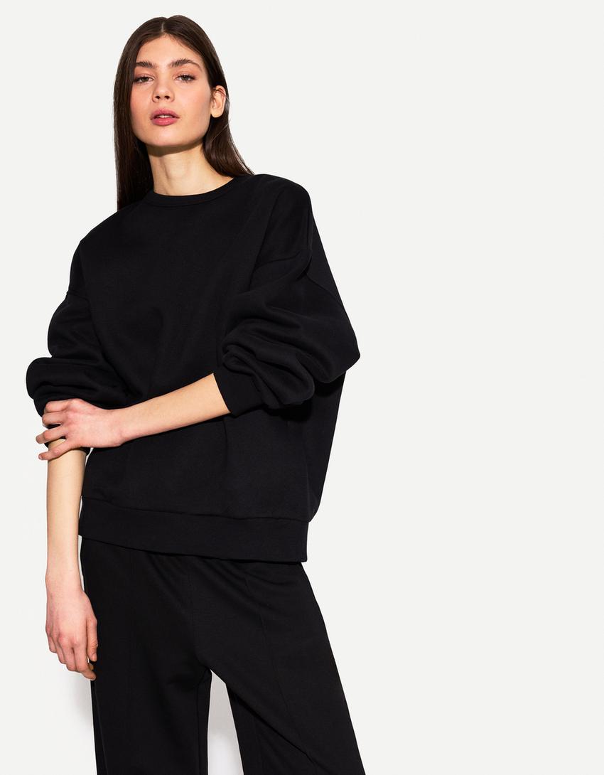 Oversize-sweatshirt med sidofickor-Svart-1