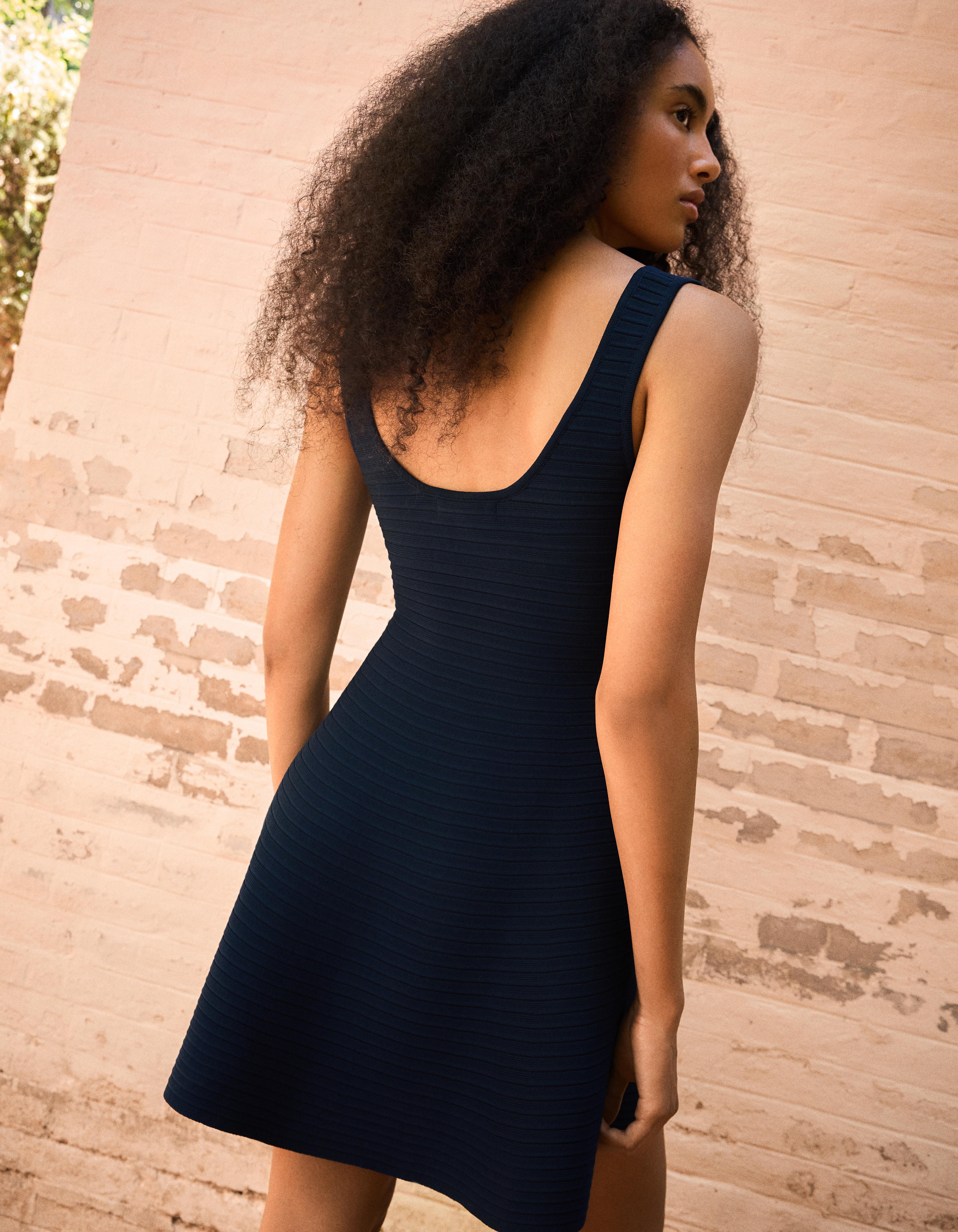Knitted mini dress with flared skirt — Navy