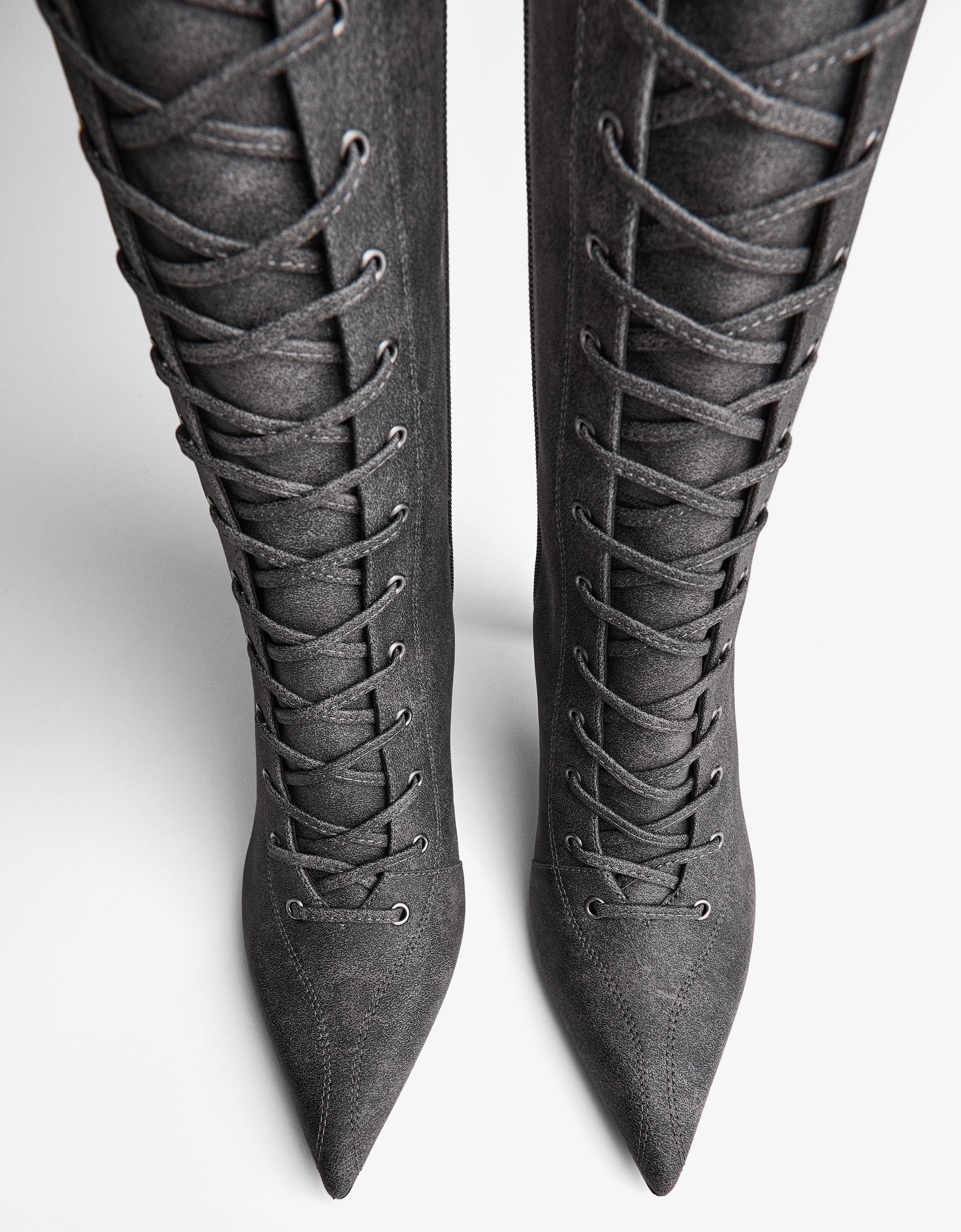 Lace-up heeled boots