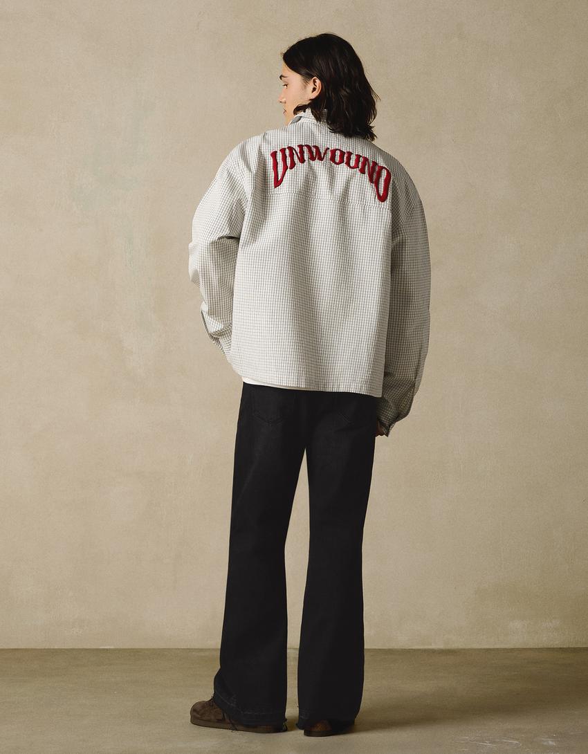 Utsvängda jeans med rak passform-Svart