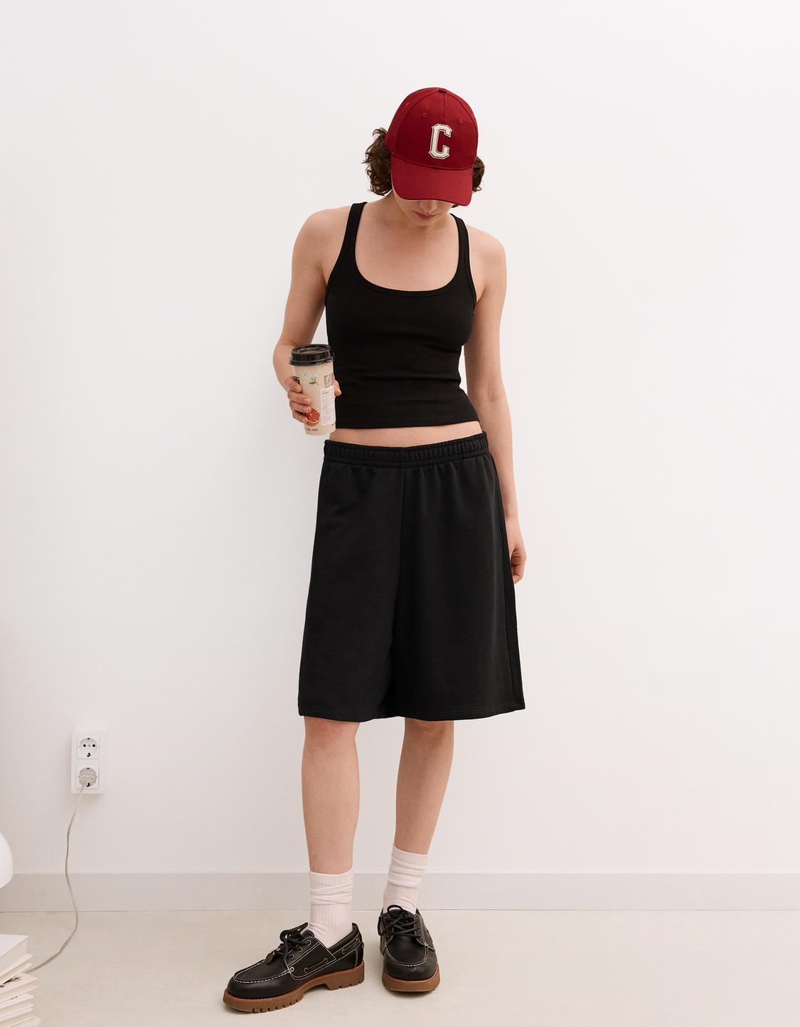Plush Bermuda shorts with embroidery