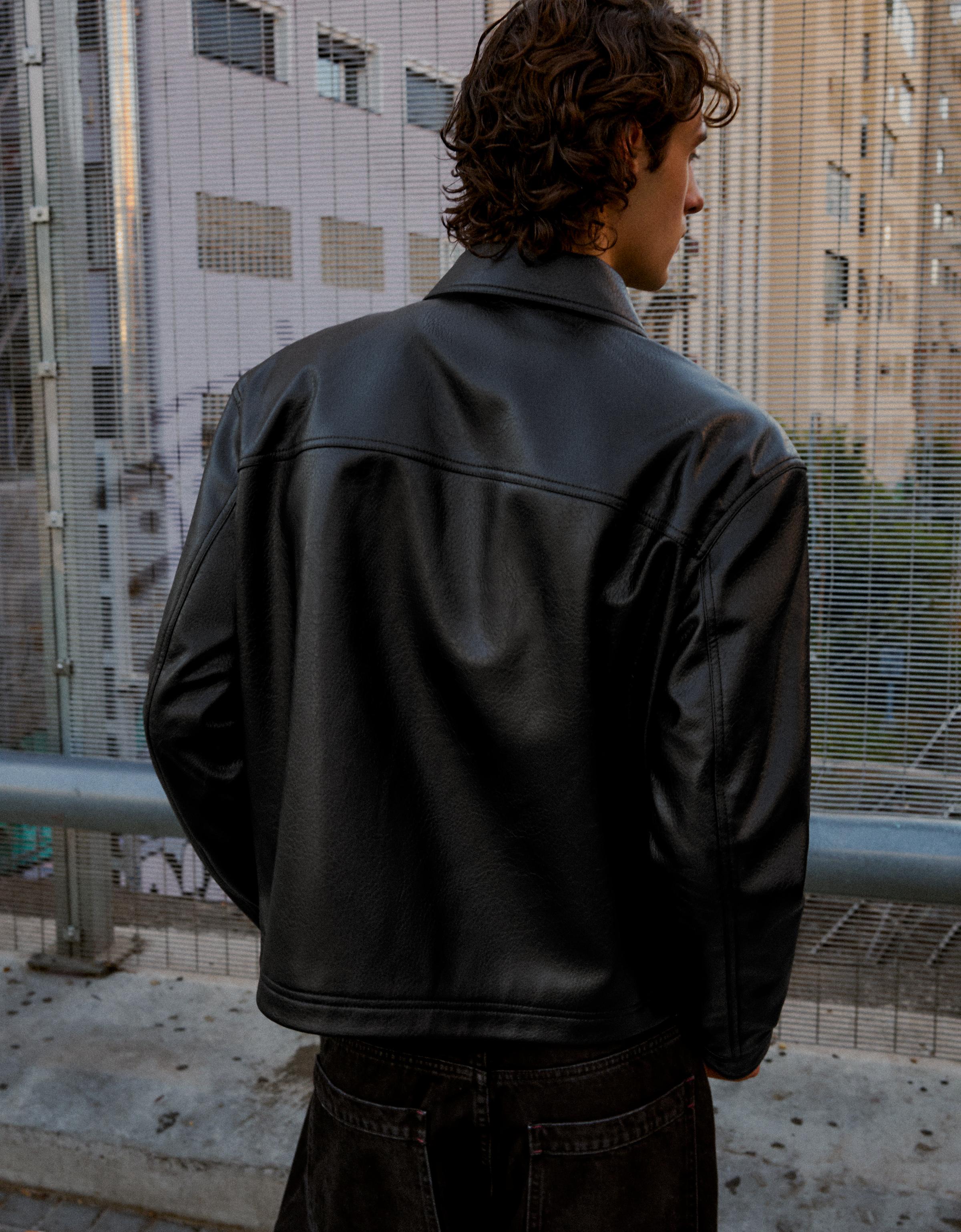 Leather effect jacket with clasps — Black