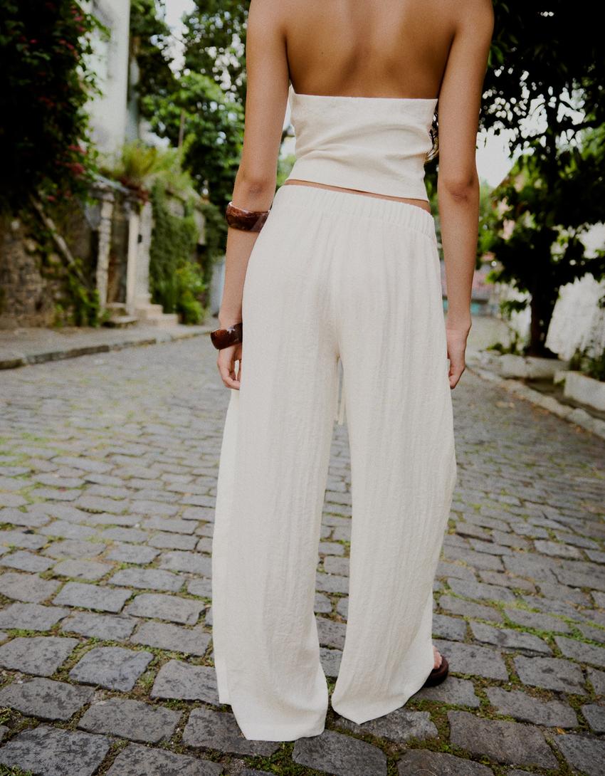 Rustic wide-leg trousers with pleats-Off white