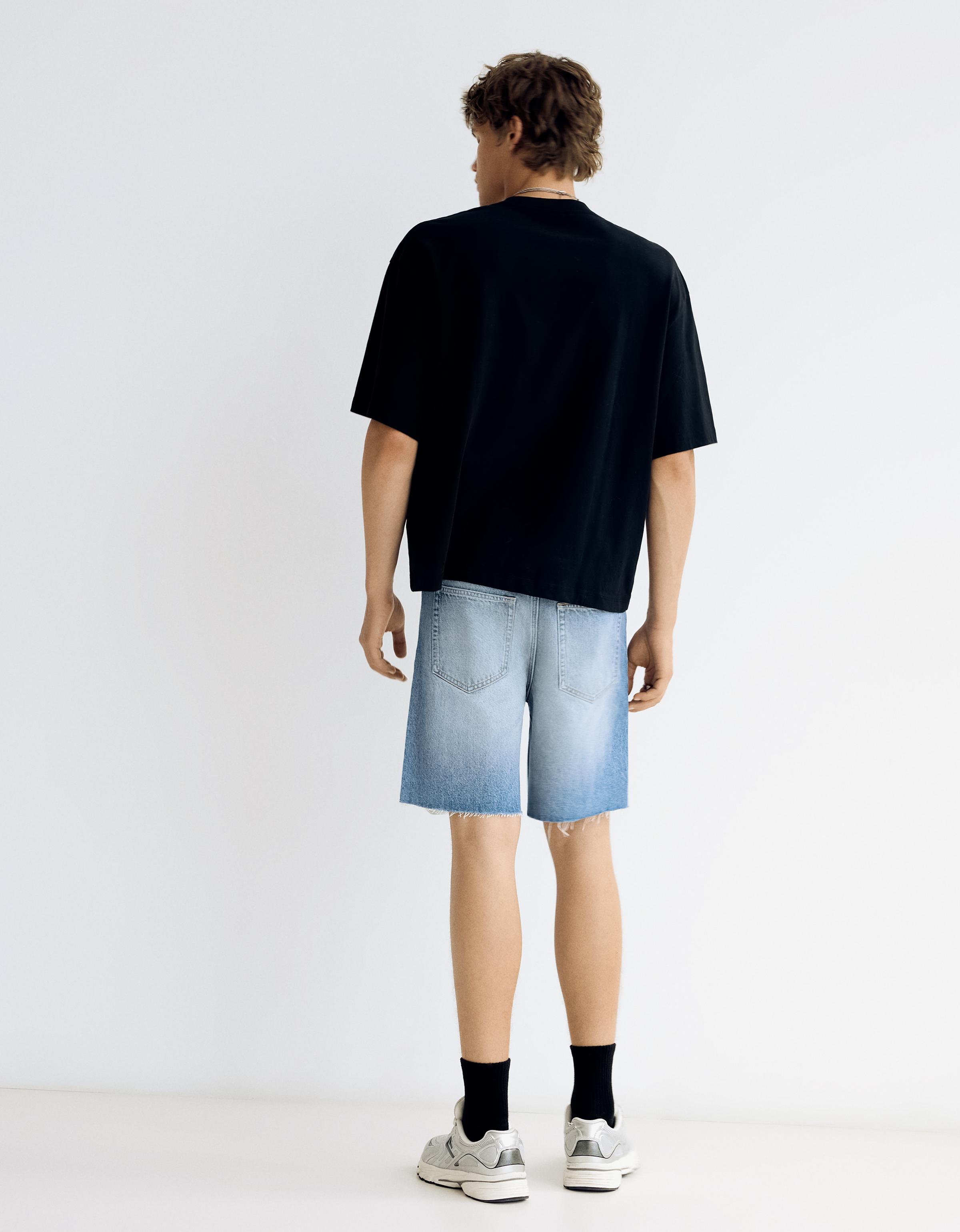 Ripped denim Bermuda shorts — Light blue