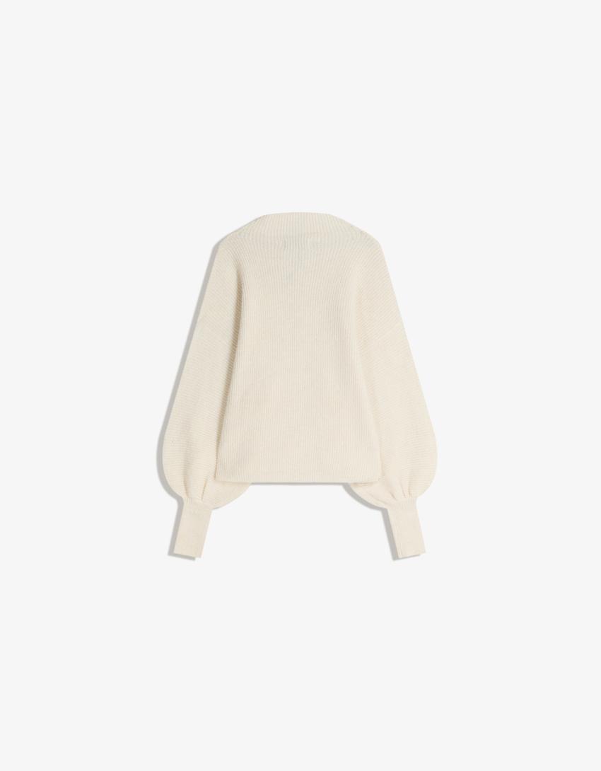 سويتر بأكمام منفوشة-كريمي