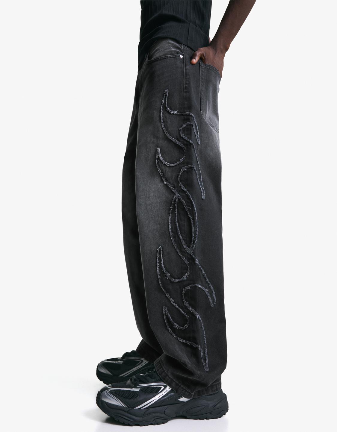 Baggy jeans with patch
