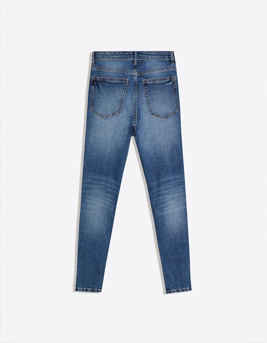 Carrot fit jeans met scheuren-Blauw