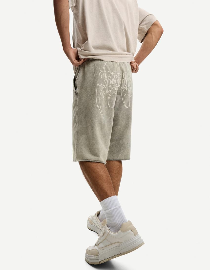 Faded-effect baggy Bermuda shorts