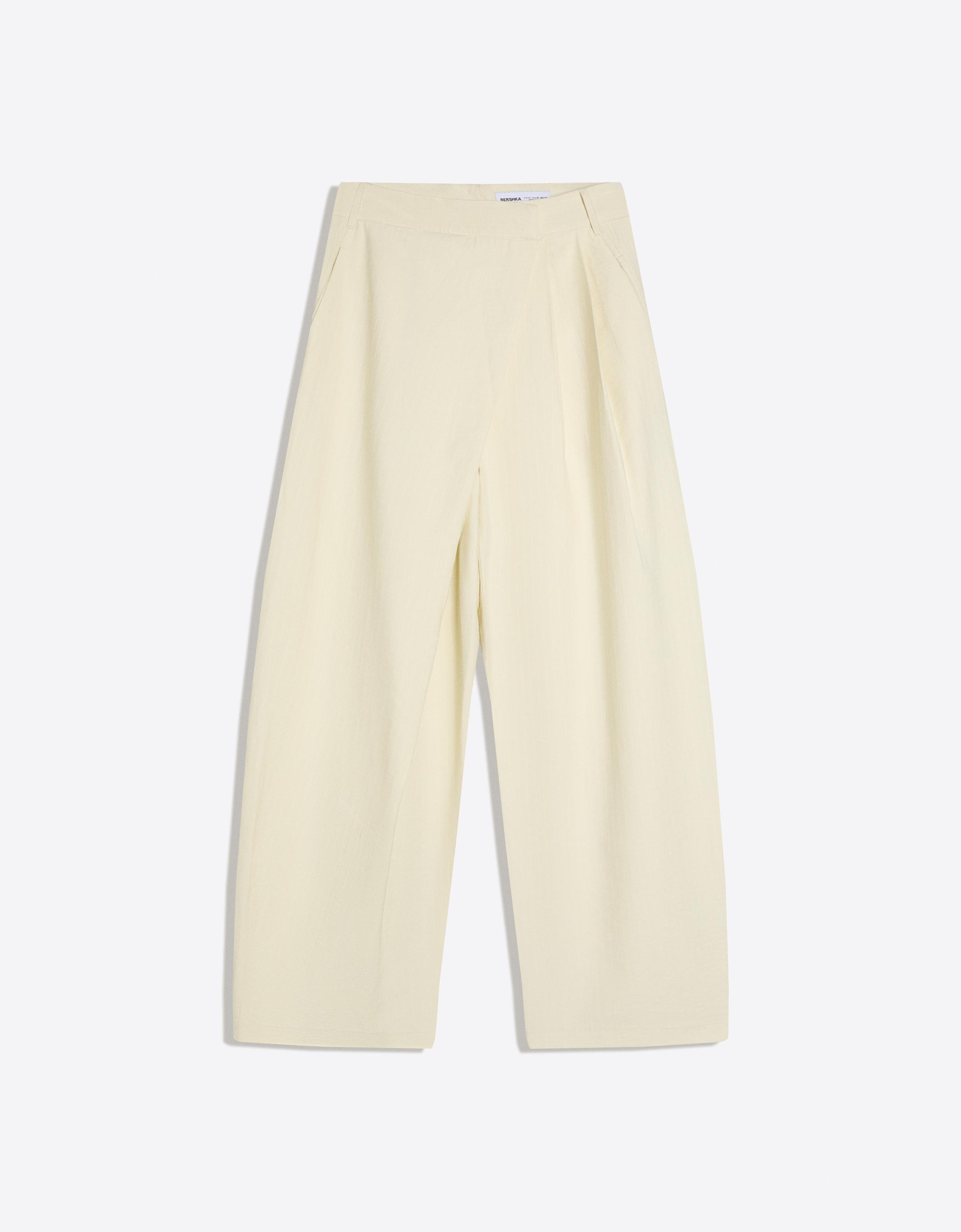 Crossover waist trousers