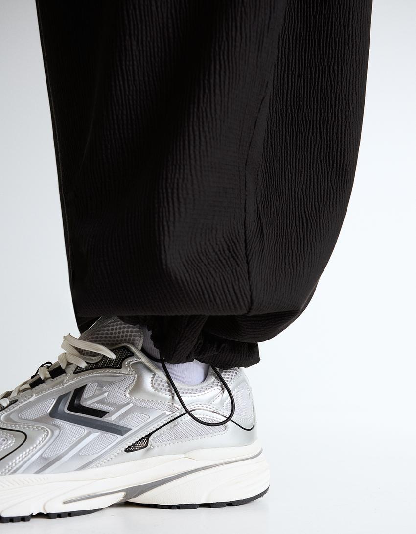 Super baggy pleated semi-jogger trousers-Black