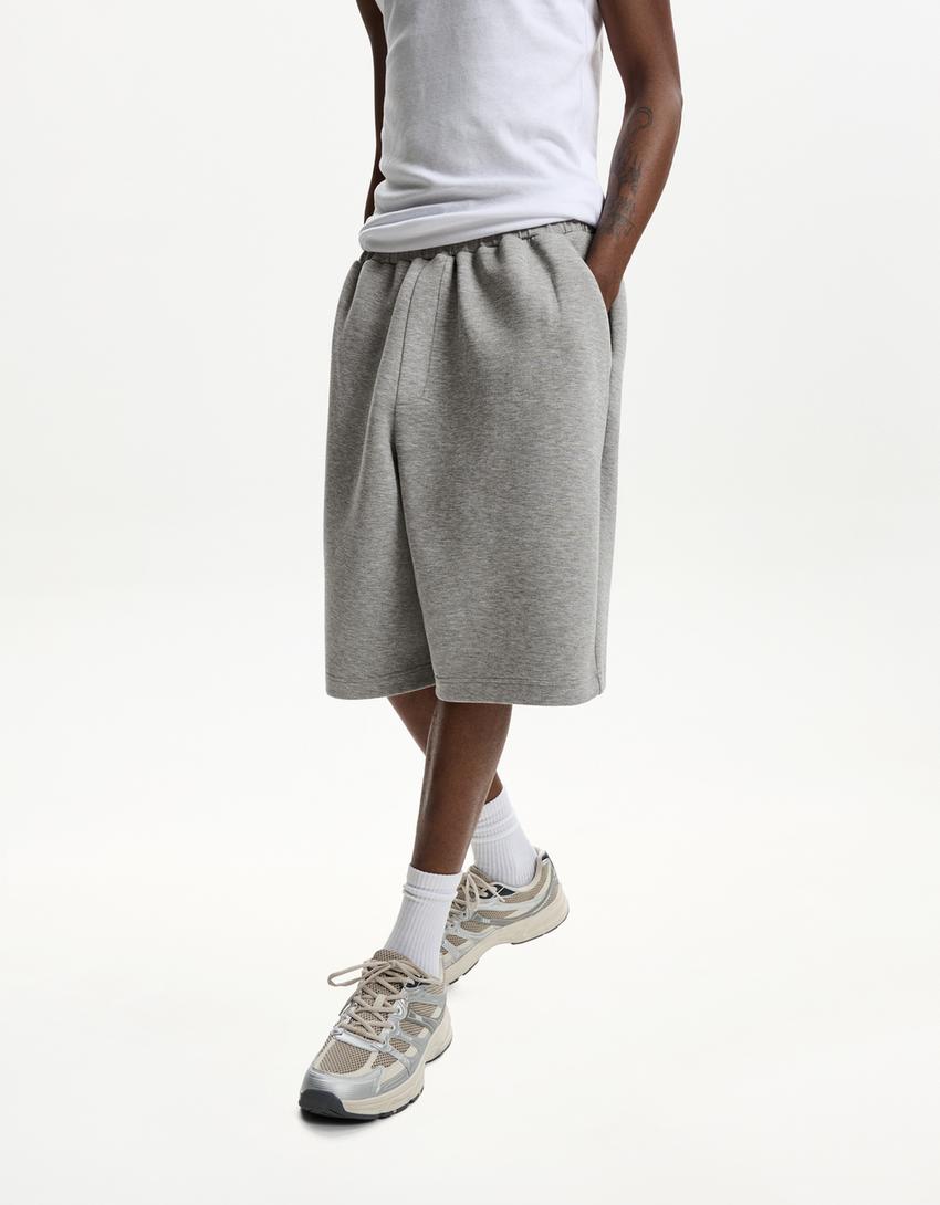 Oversize neoprene-effect Bermuda shorts