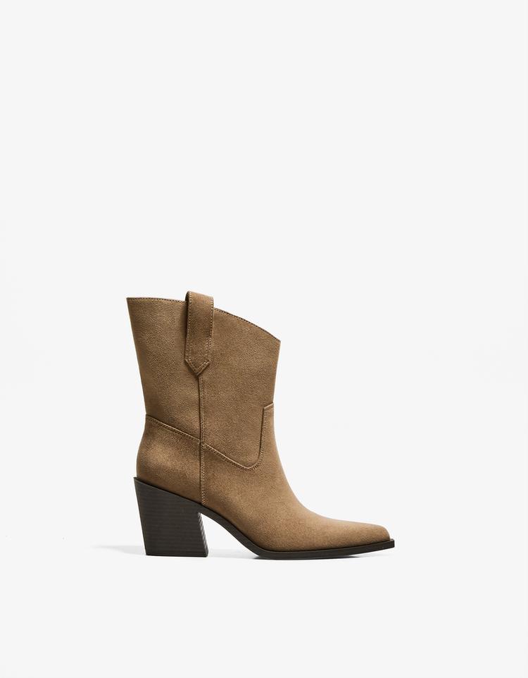 Asymmetric heeled cowboy ankle boots