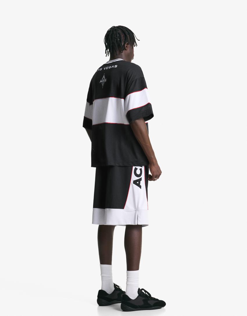 T-shirt WNBA manga curta-Preto