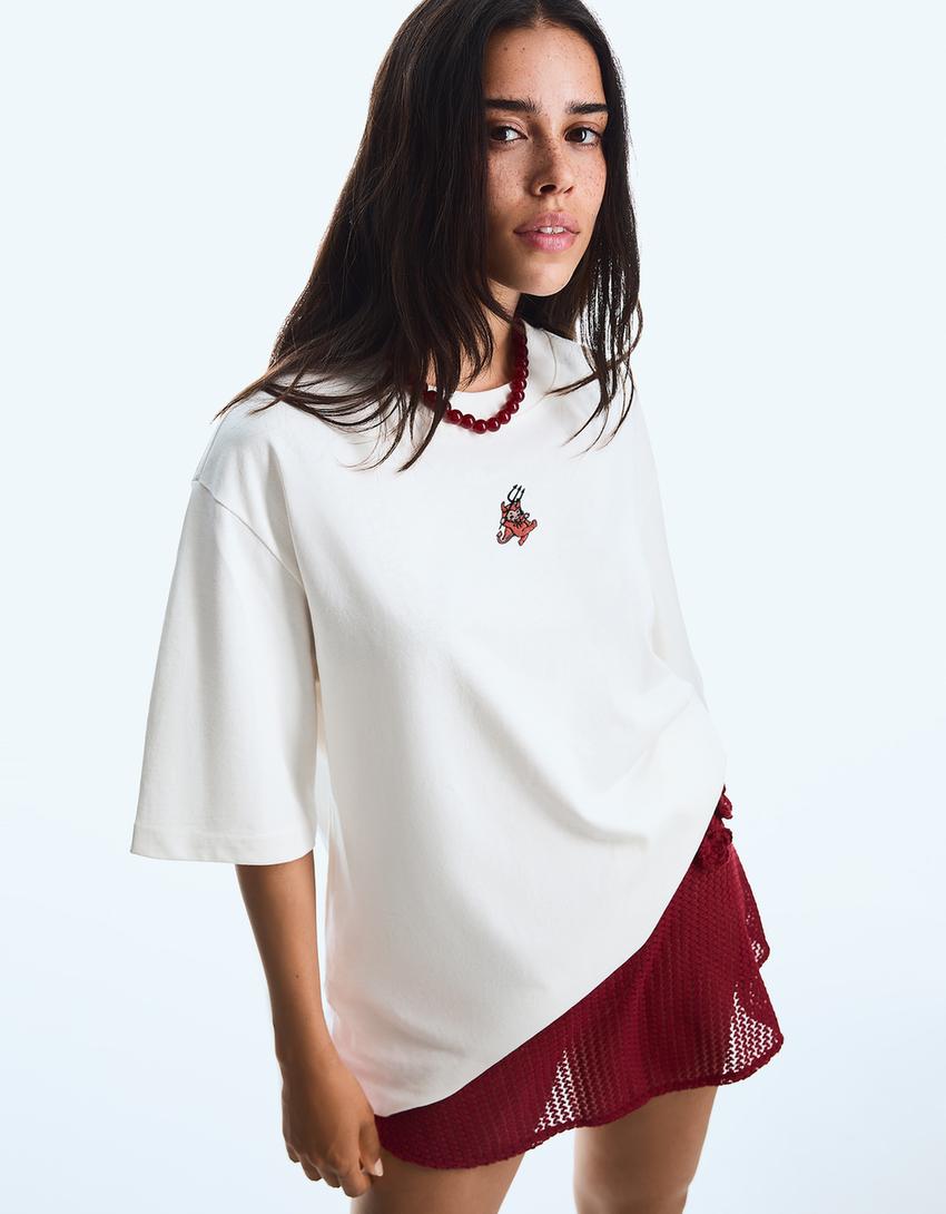 Kortärmad t-shirt i oversizemodell heavy cotton-Benvit