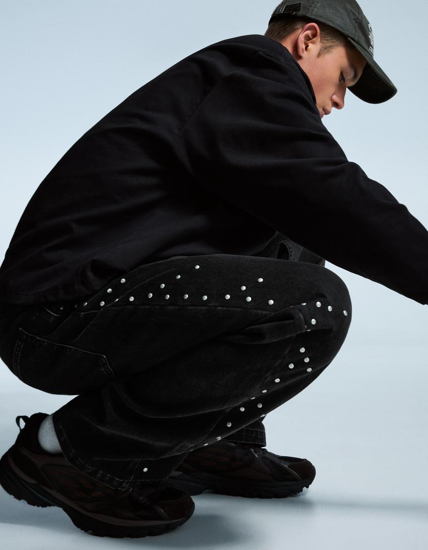 Baggy fit zımbalı jean-Siyah