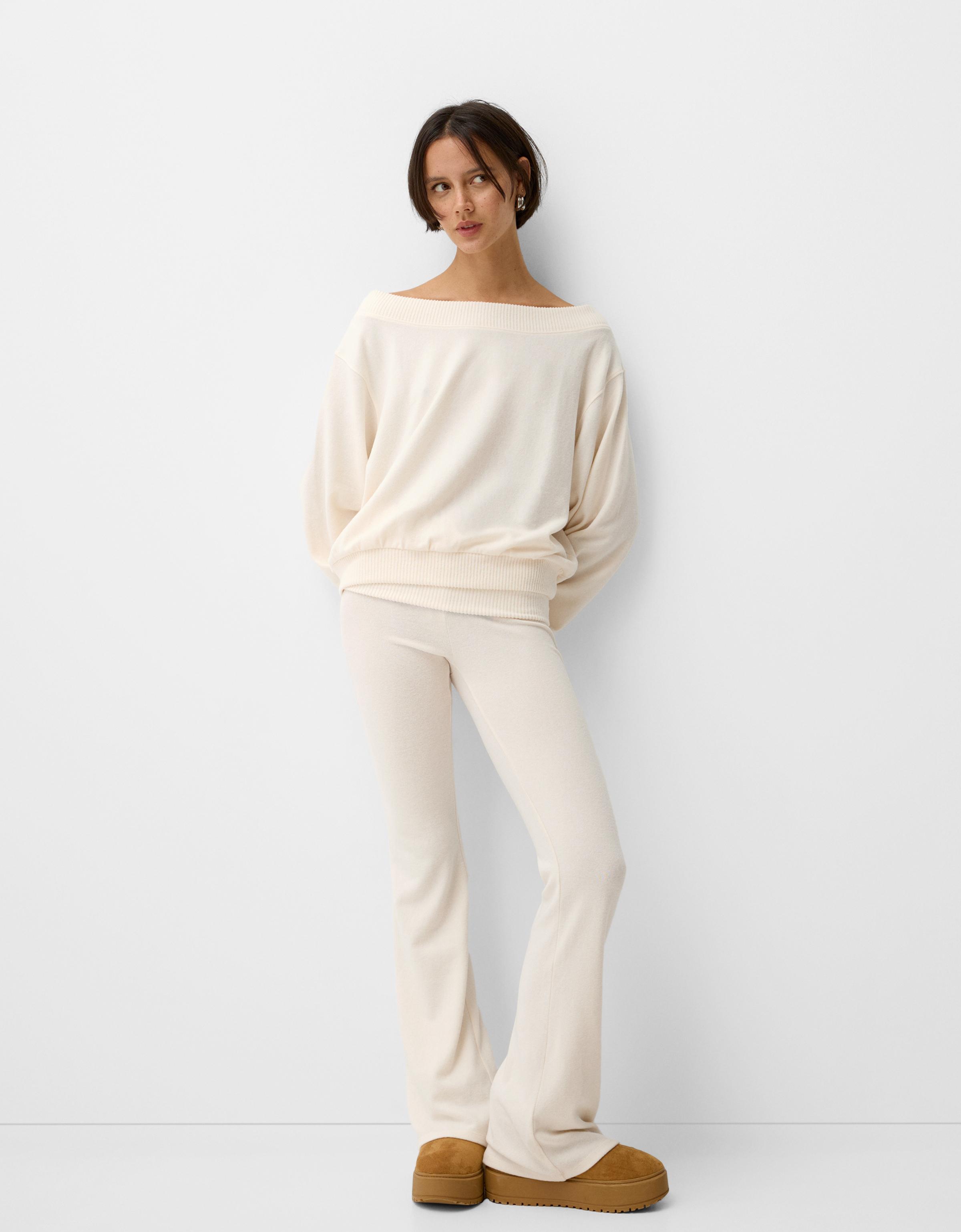 Soft touch flared pants with fold-over waist - COMBO WINS % - Women |  Bershka