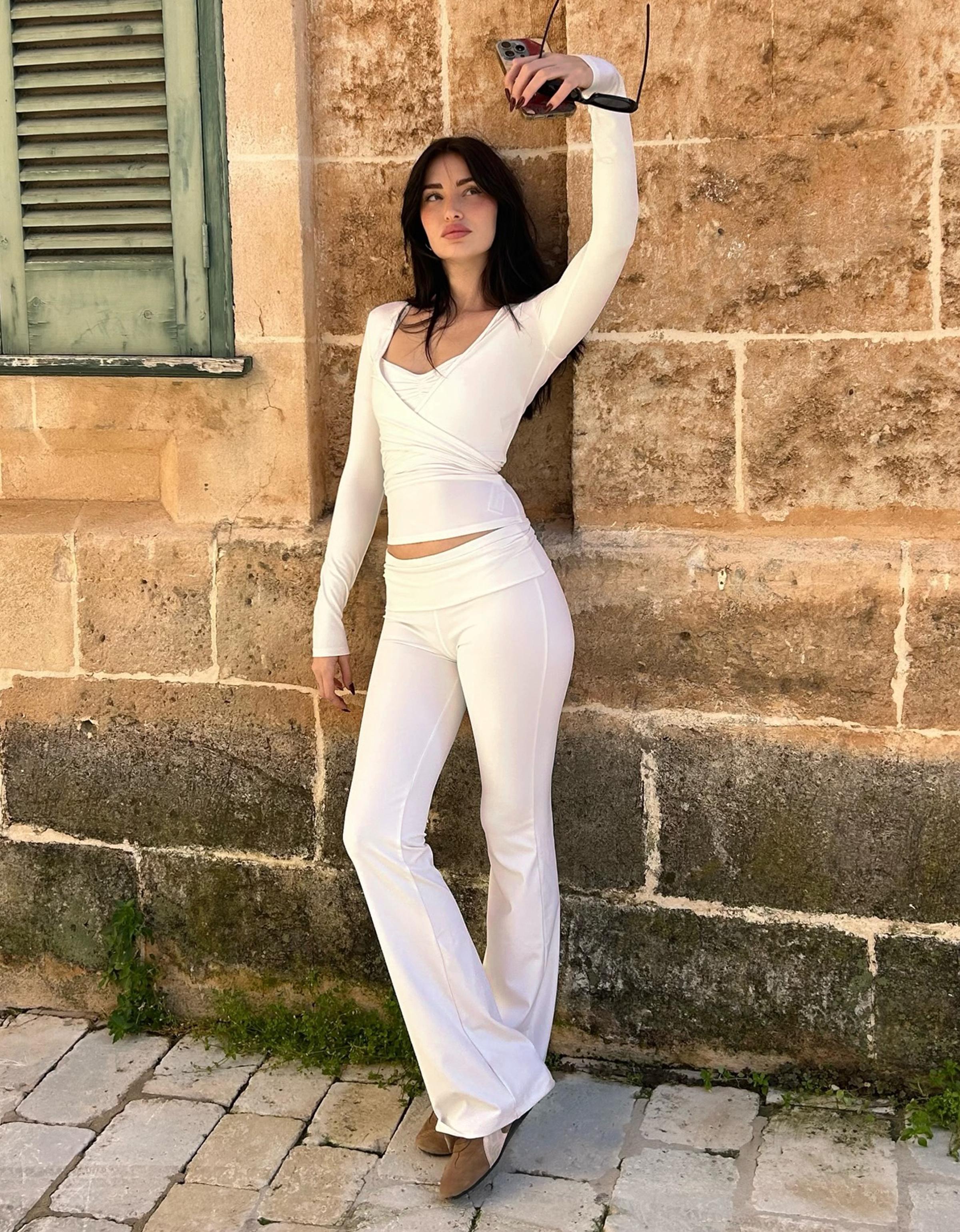 Flared technical trousers with turn-down waist