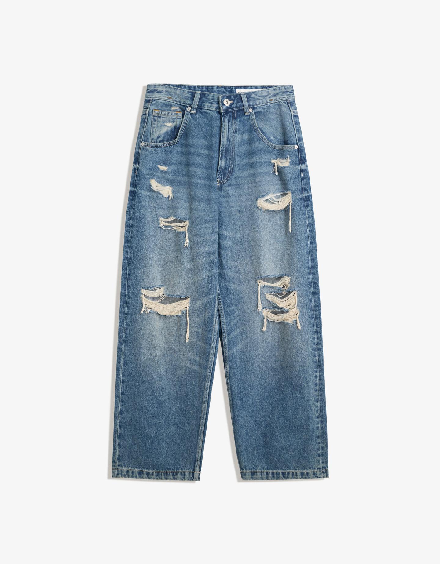 Bershka jeansy superbaggy z dziurami niebieski