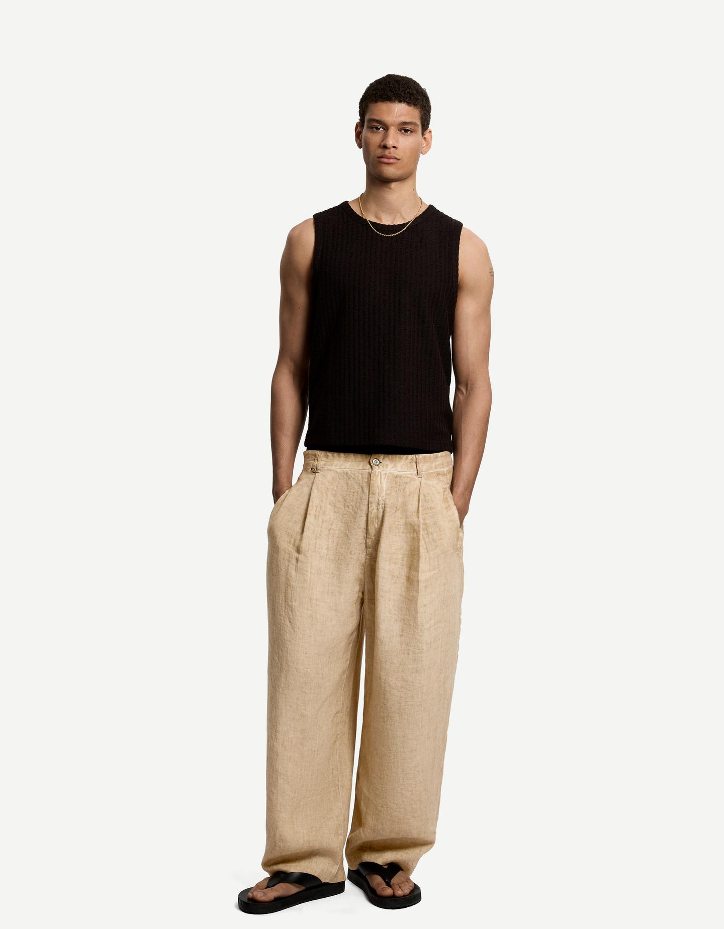 Bershka spodnie o kroju balloon z lnu piaskowy