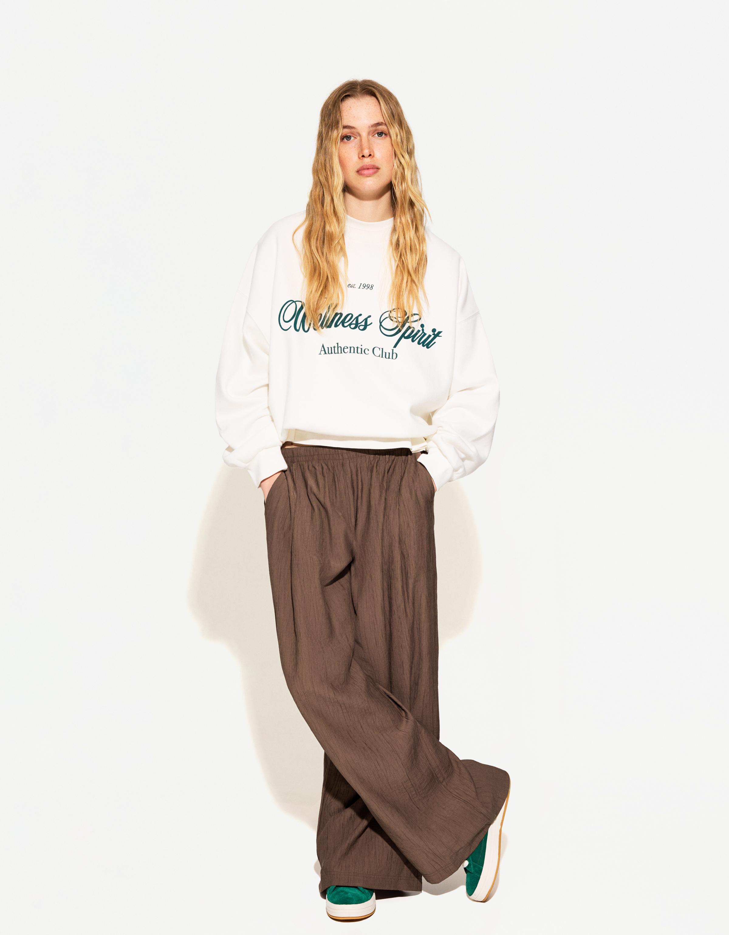 Flowing wide-leg textured trousers with drawstring — Brown