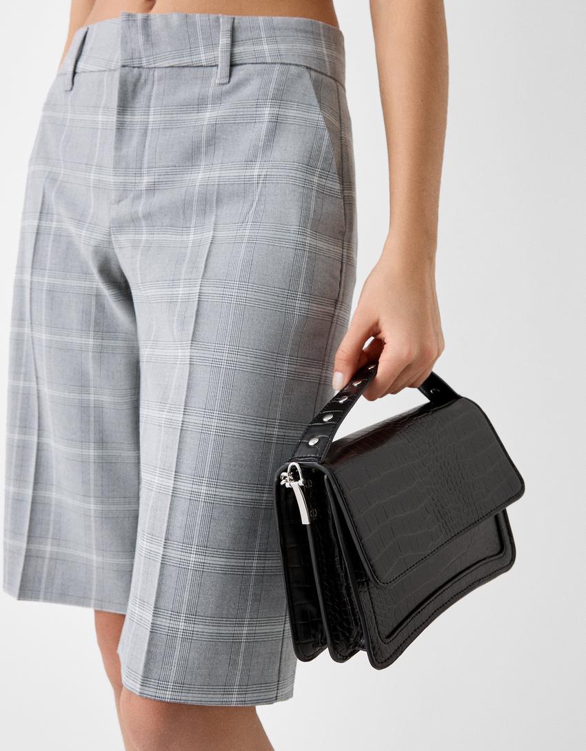 حقيبة كلاتش من جلد صناعي بدبابيس معدنية-أسود-1