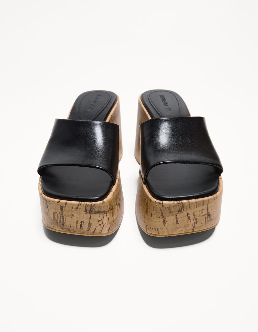 صندل بكعبية مفتوحة ونعل سميك-أسود