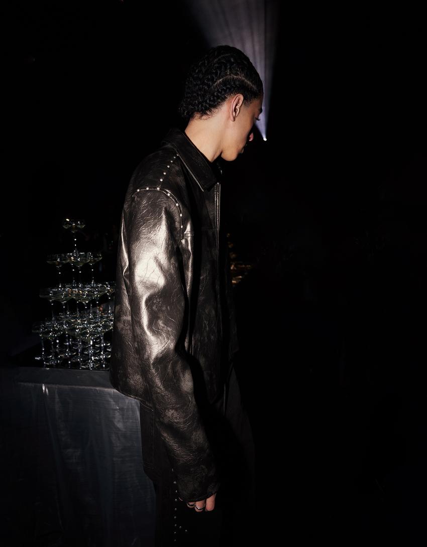 Casaco polipele tachas-Preto