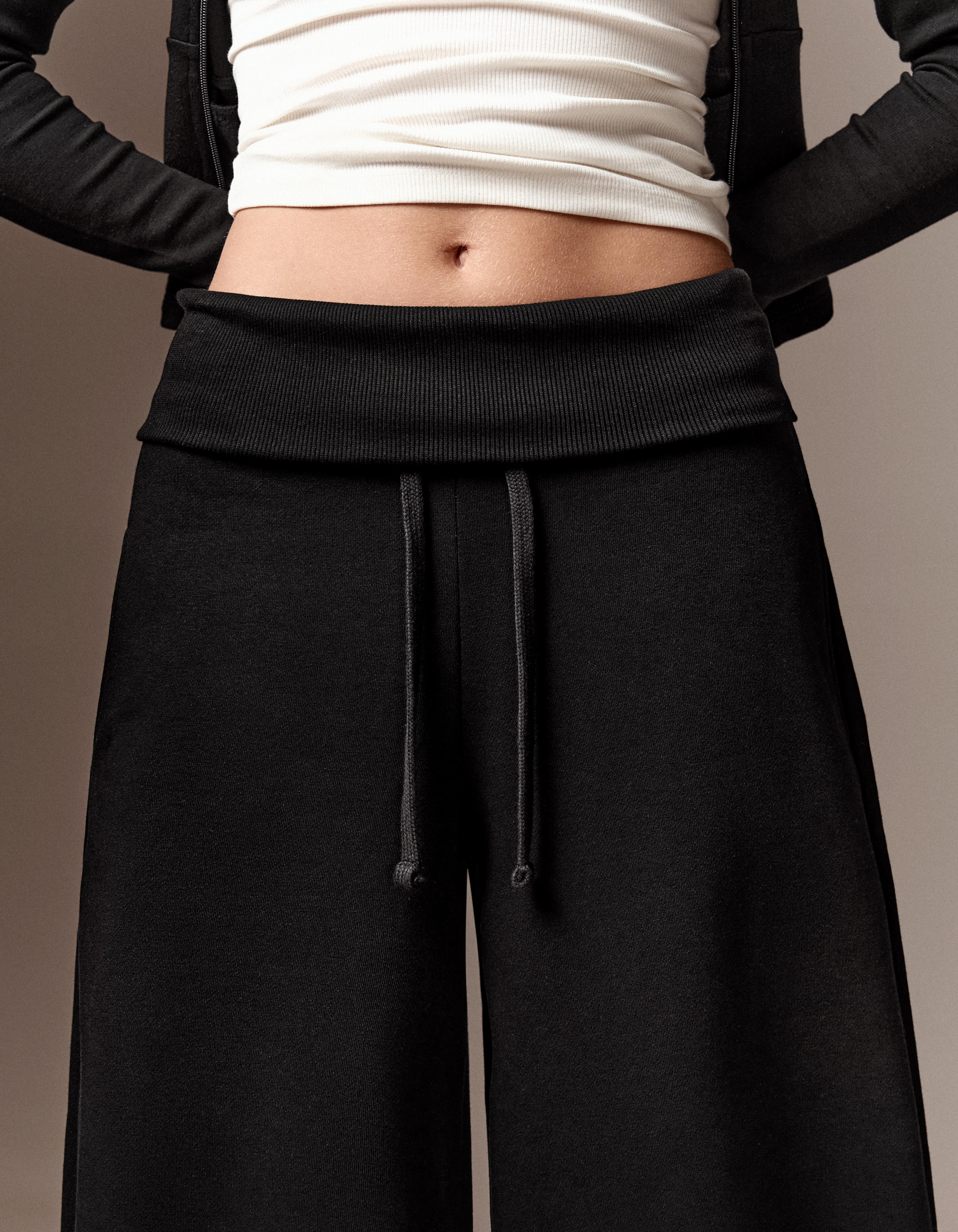 Barrel-leg jersey trousers with fold-over waist — Black