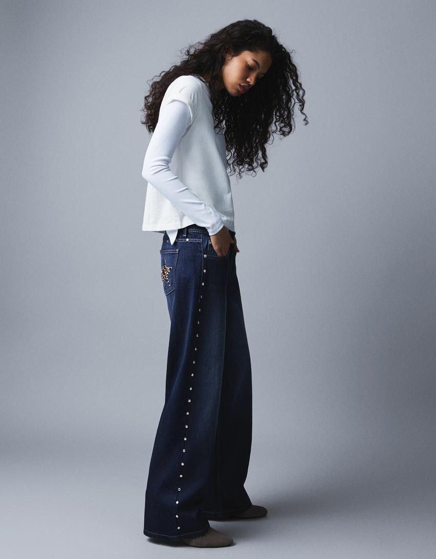 Baggy Jeans mit tiefem Bund und Sternnieten-Blau