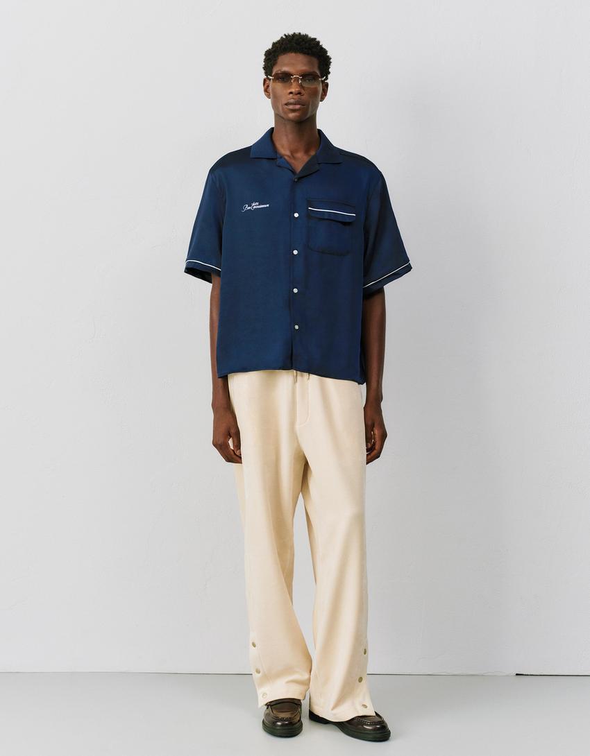 Pantaloni balloon fit jogger con borchie-Avorio