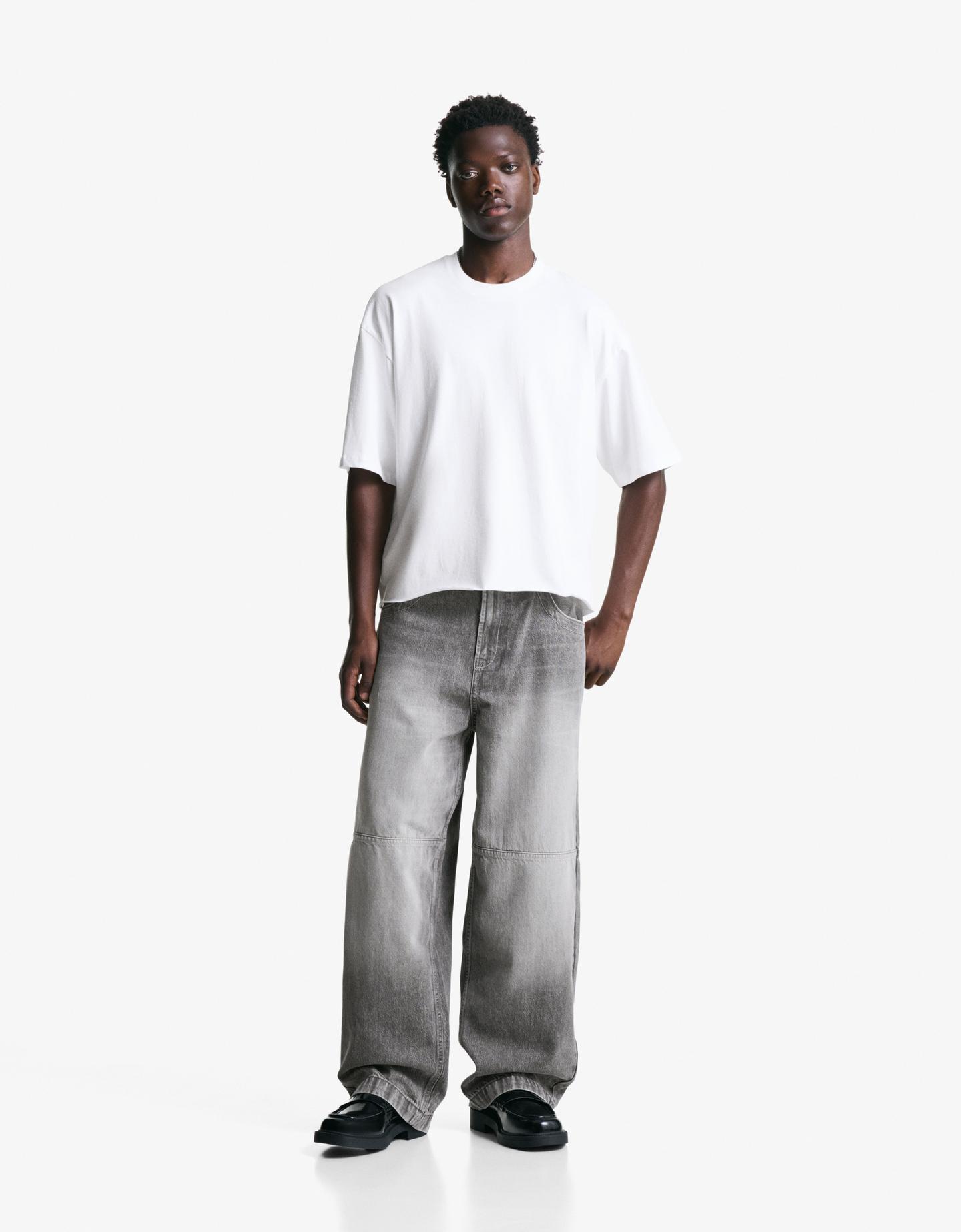 Bershka jeansy o kroju super baggy szary