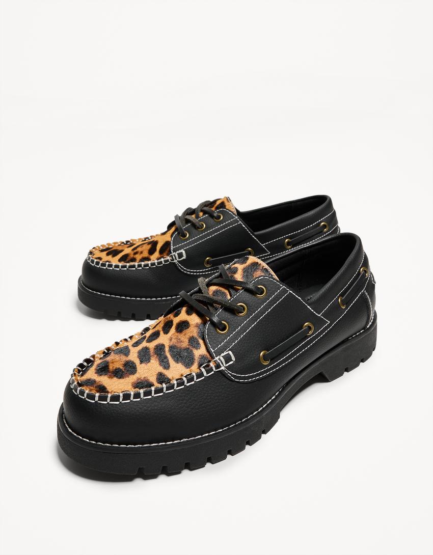Animal print deck shoes