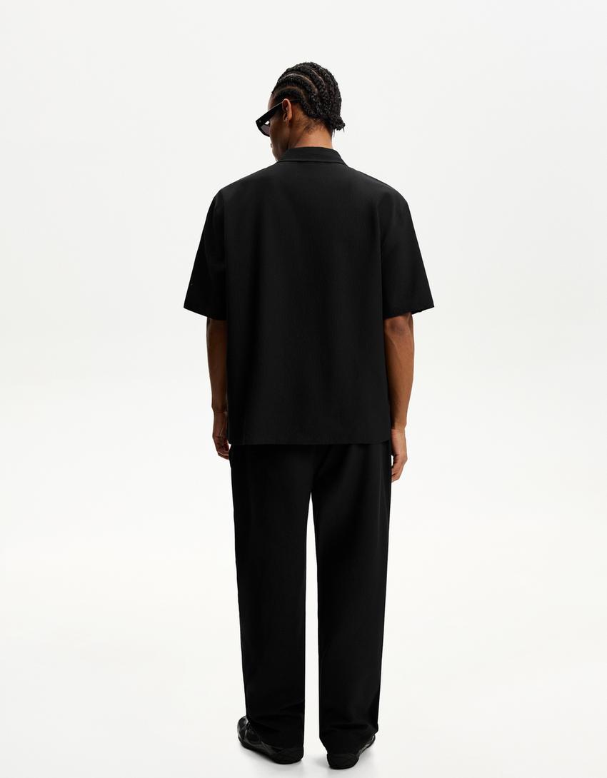 Pantalon baggy jogger plissé