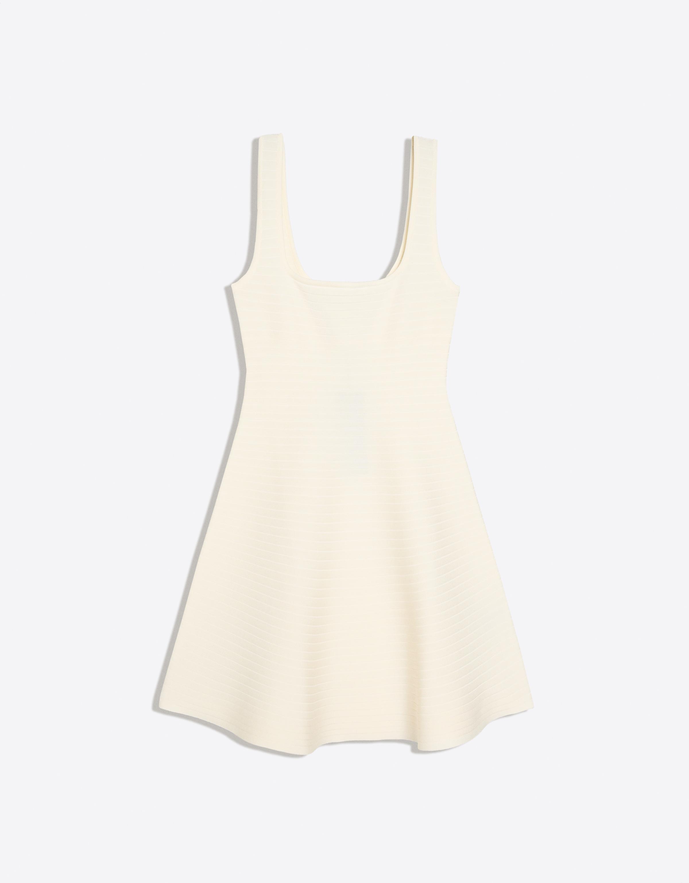 Knitted mini dress with flared skirt — Cream