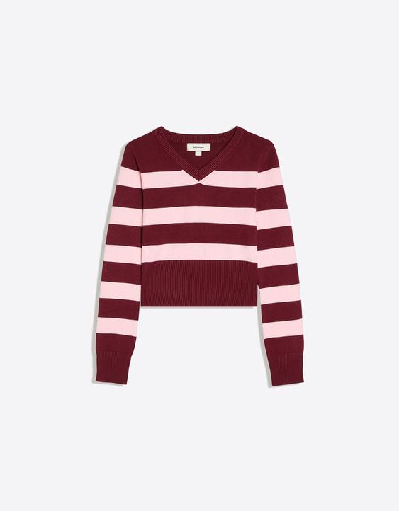 Haftowany sweter z dekoltem w serek