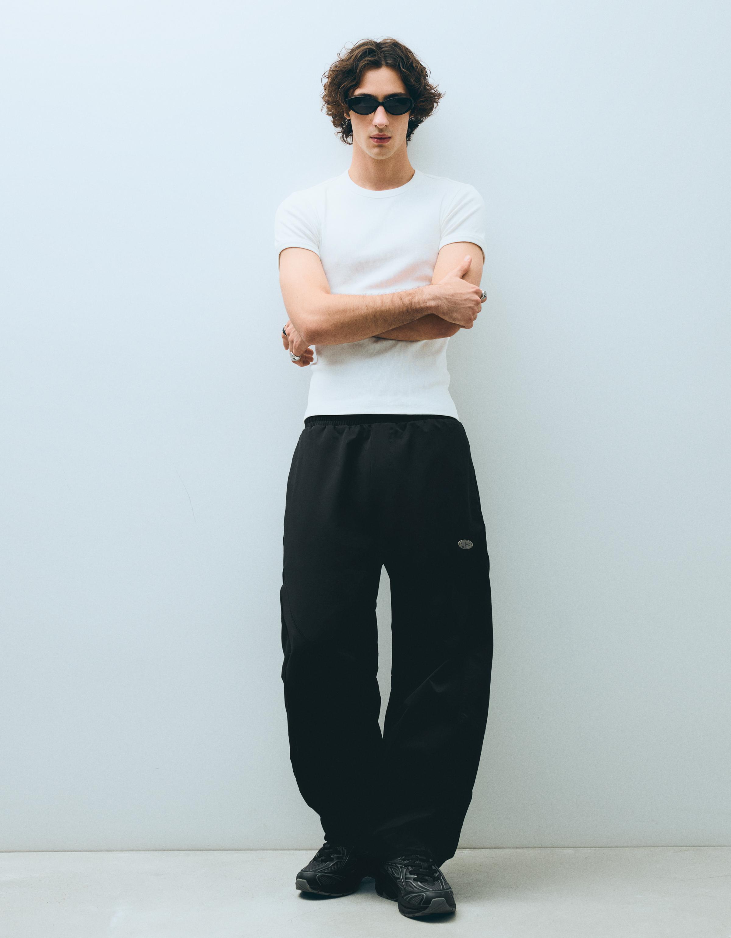 Technical barrel trousers — Black