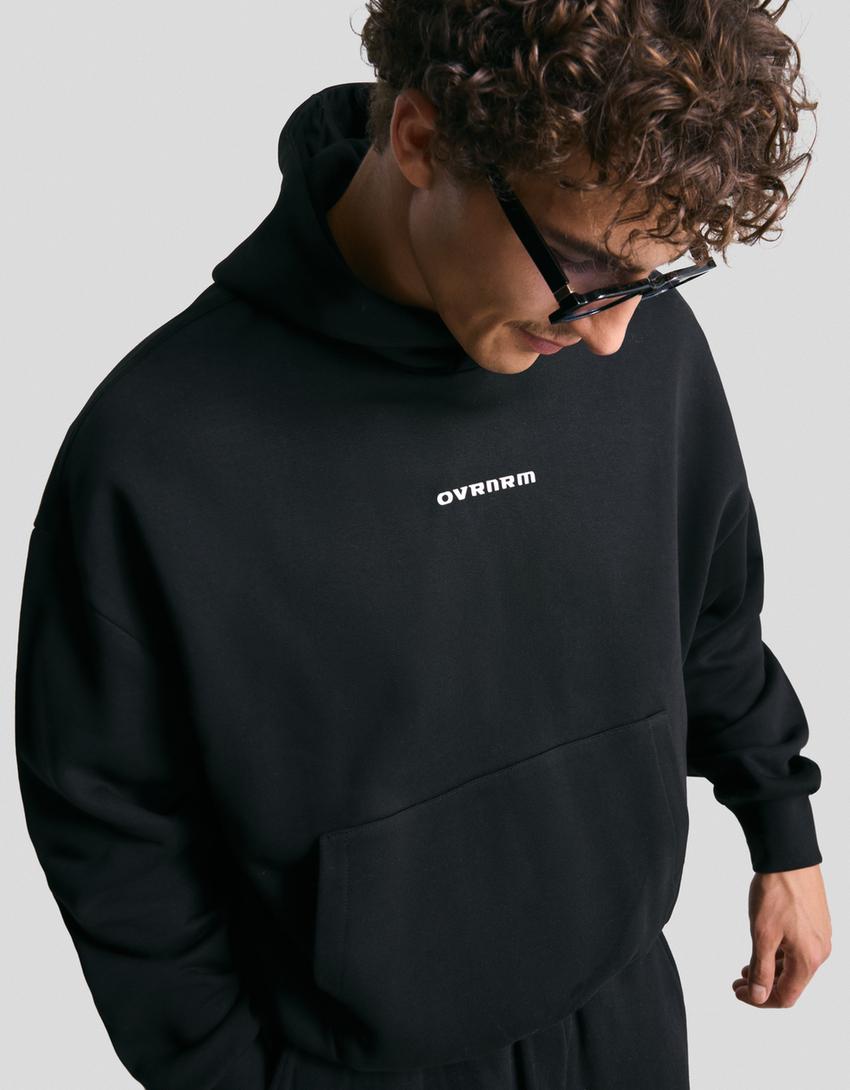Sweat Boxy fit à capuche imprimé-Noir