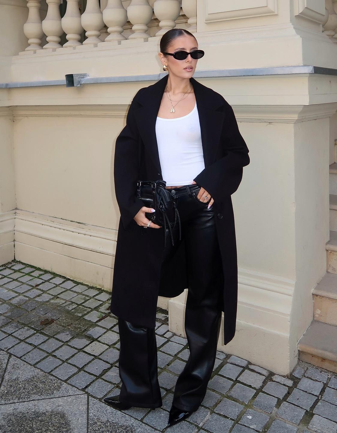 Leather effect boot-cut trousers