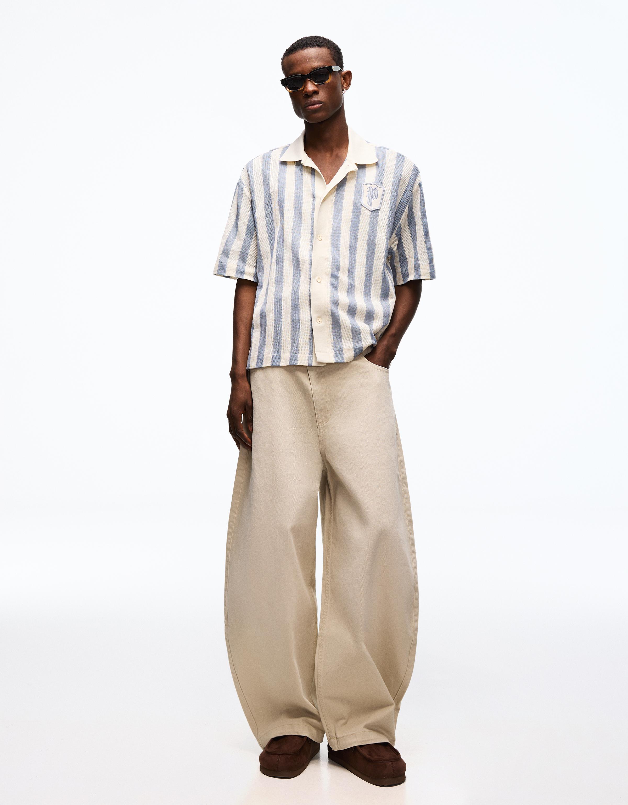 Embroidered crossover barrel trousers — Sand