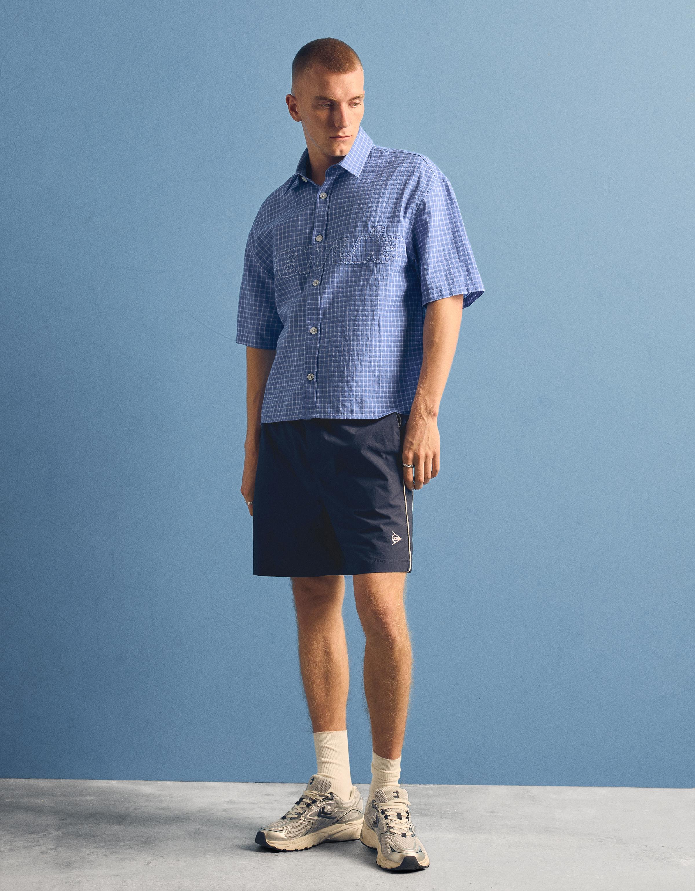 DUNLOP technical boxy Bermuda shorts